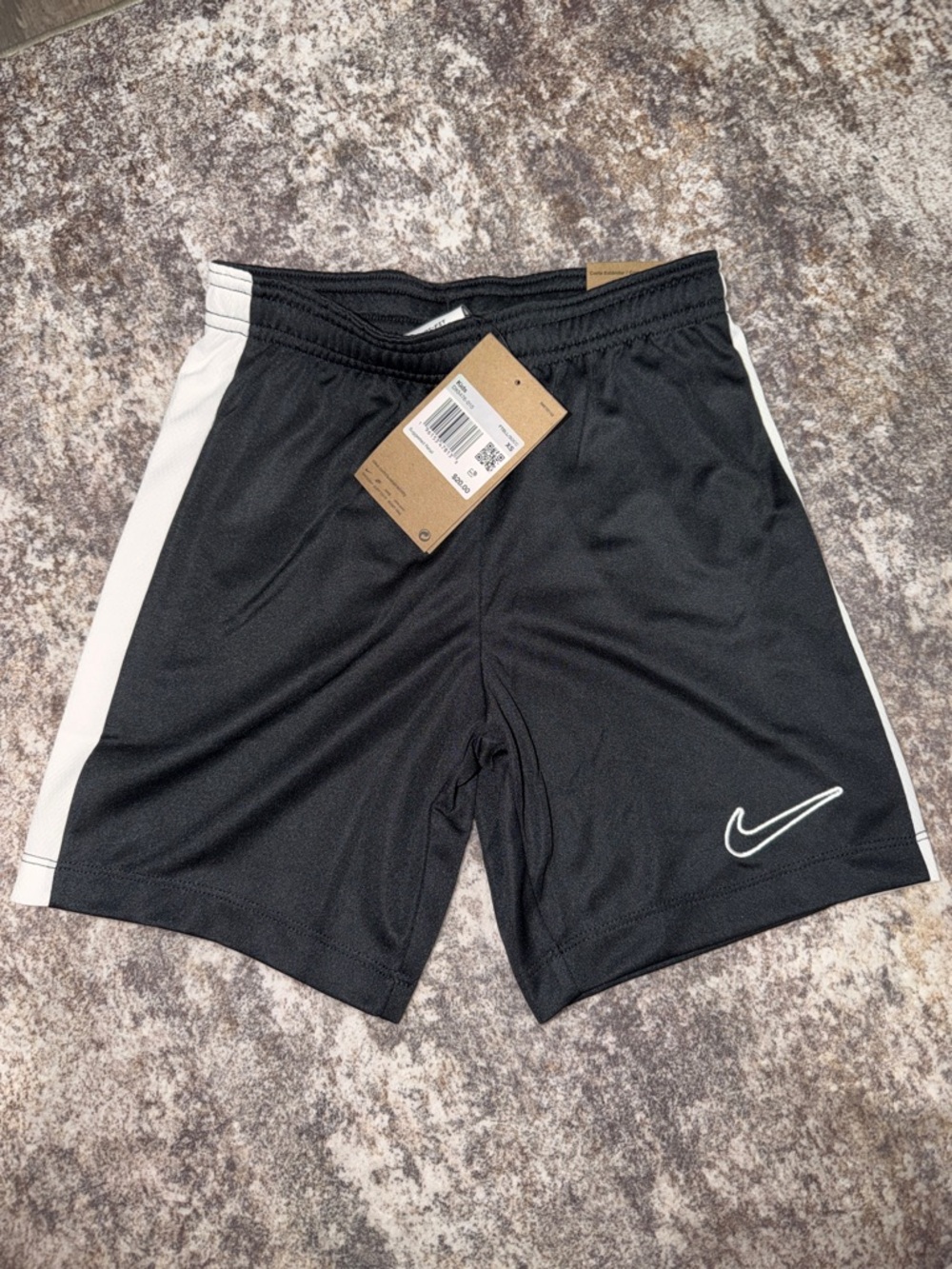 Nike Kids Black Athletic Shorts with White Swoosh